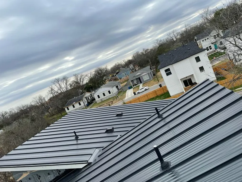 Standing seam metal roof panels with vents for Skylight Repair in South Union